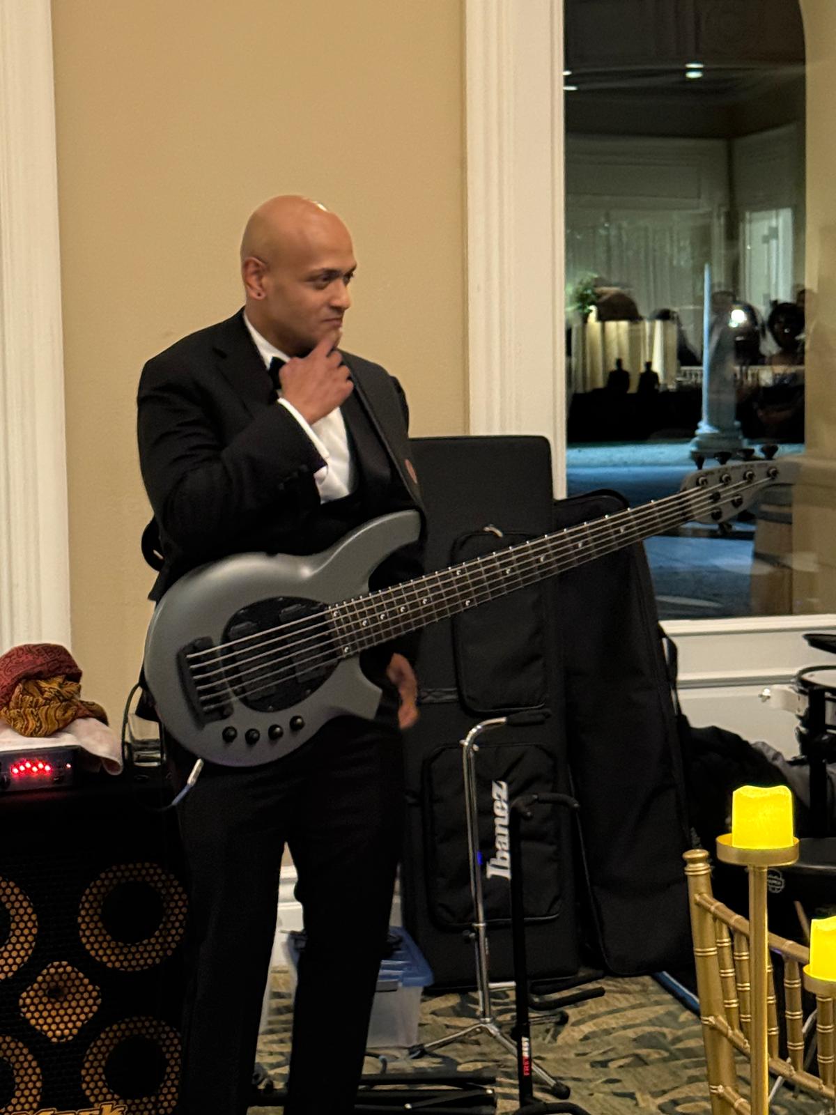 Bassist with electric bass guitar